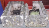 Two composition stone troughs