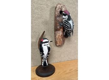 Two contemporary artisan carved