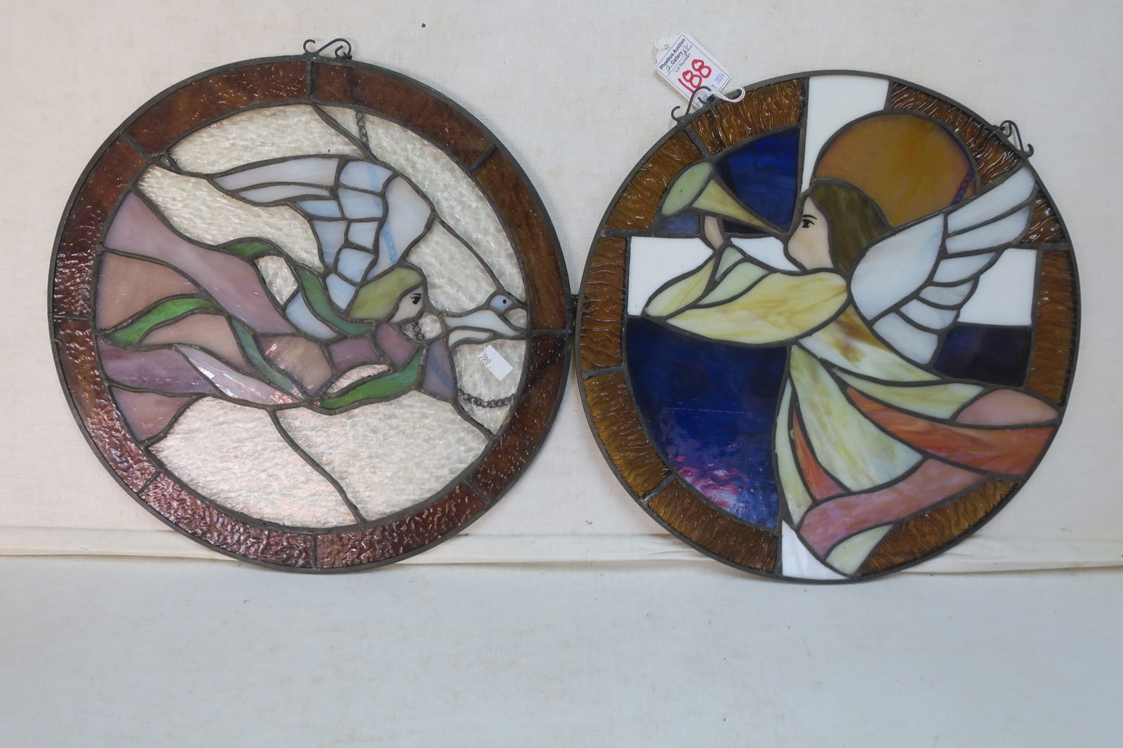 TWO CONTEMPORARY ROUND STAINED