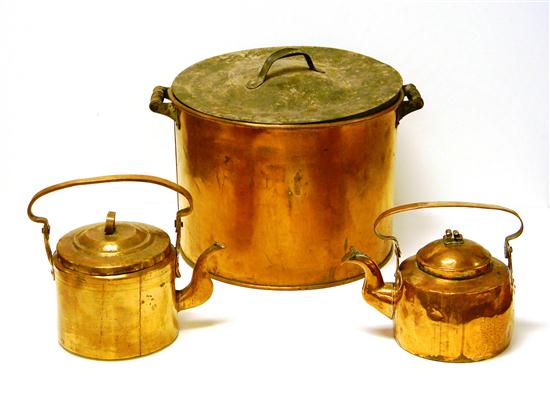 Two copper kettles dovetail