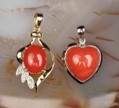 TWO CORAL AND FOURTEEN KARAT G