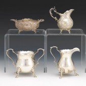 TWO CREAM AND SUGAR SETS  One
