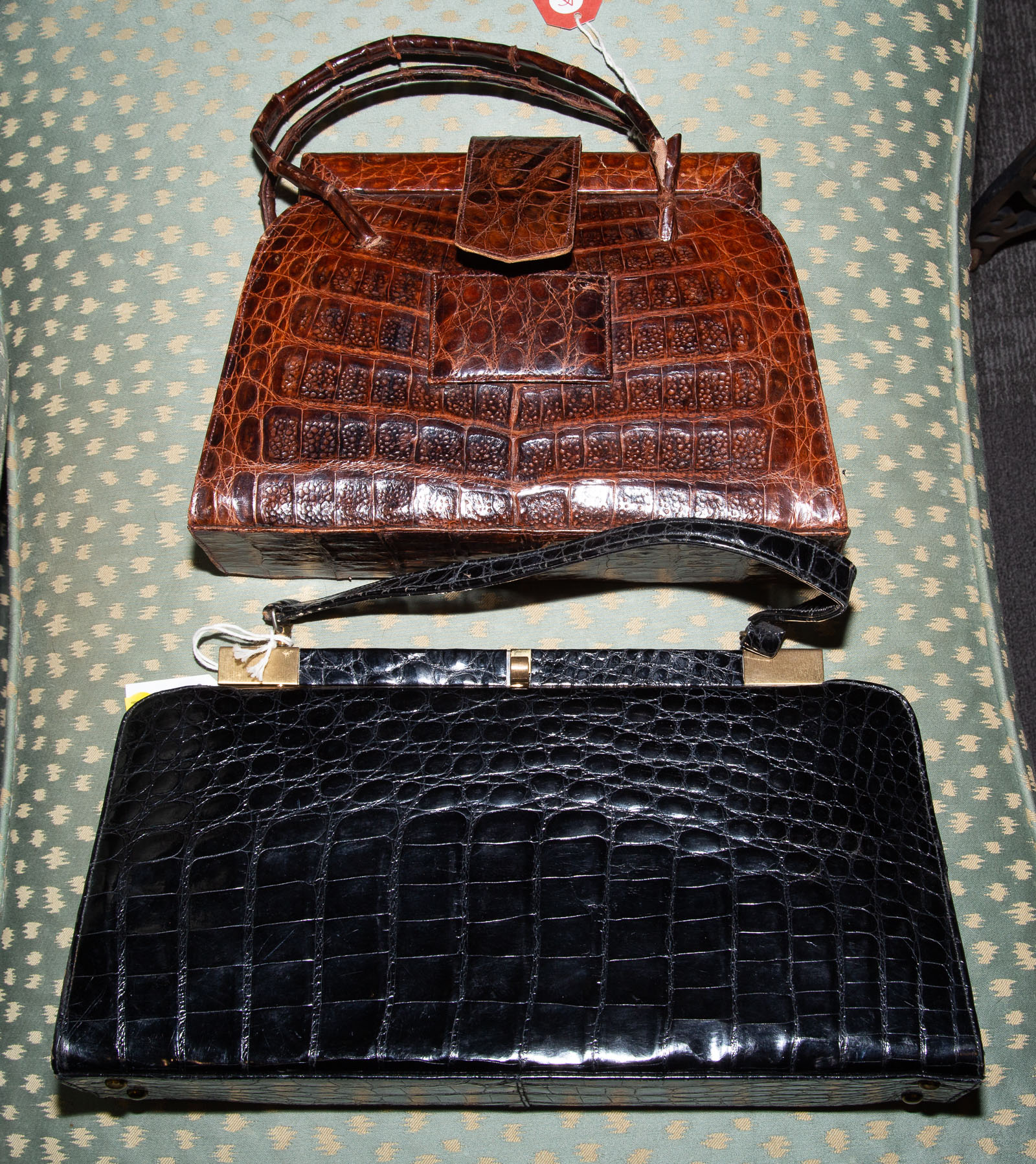 TWO CROCODILE EMBOSSED HANDBAGS One