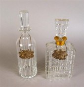 Two cut glass decanters    One