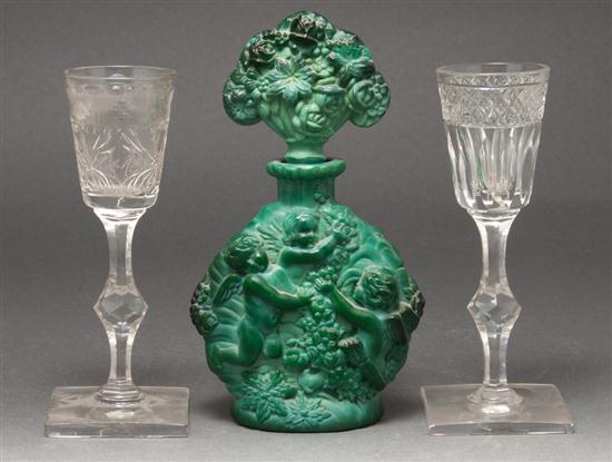Two cut glass wine stems and a