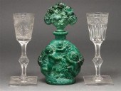Two cut glass wine stems and a