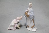 TWO CYBIS FIGURES.  American