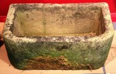 Two D shaped stone troughs 77c