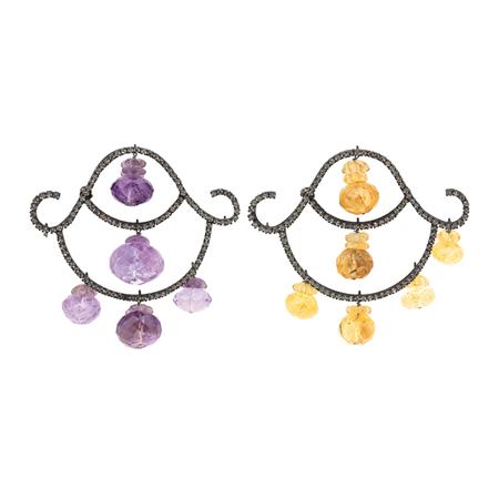 Two Dangling Brooches 	 