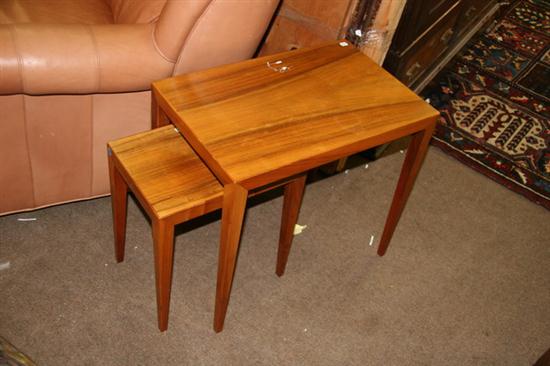 TWO DANISH TEAKWOOD NESTING TABLES.