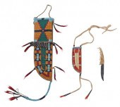 TWO DECORATED HIDE KNIFE SHEAT