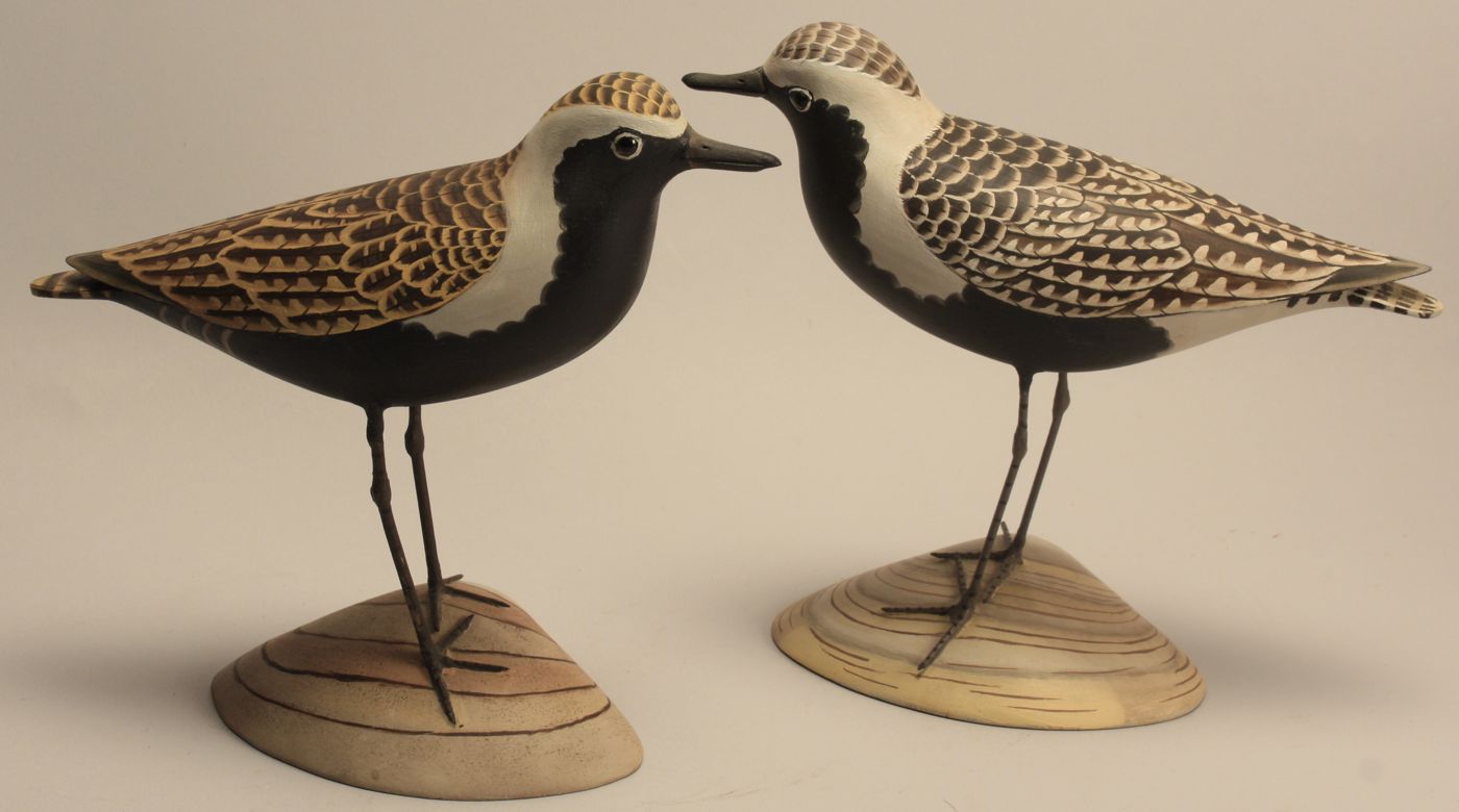 TWO DECORATIVE PLOVER CARVINGSBy