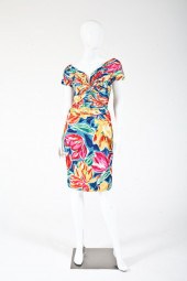 TWO DESIGNER DRESSES. Comprisi