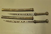TWO DHA SWORDS. Inlaid blades