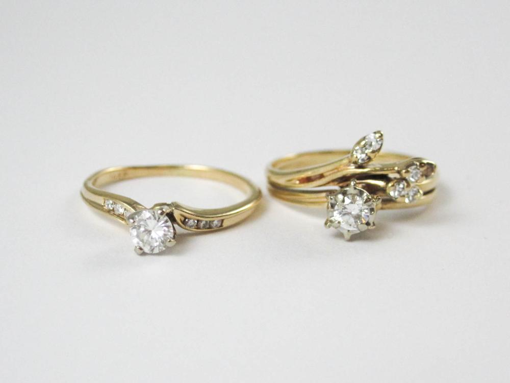 TWO DIAMOND AND FOURTEEN KARAT GOLD