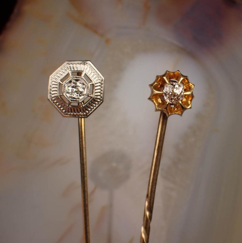 TWO DIAMOND AND FOURTEEN KARAT GOLD