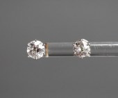 TWO DIAMOND STUD PIERCED EARRI