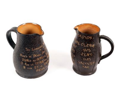 Two Doulton stoneware jugs, the