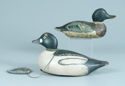 Two duck decoys: green wing teal,