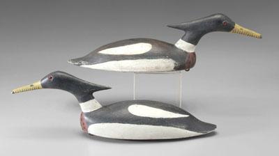 Two duck decoys: hooded mergansers,