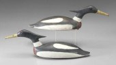 Two duck decoys: hooded mergan