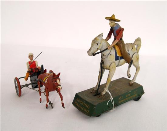 Two early 1900s tin toys: a