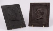 Two early 20th Century cast pl