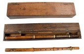 TWO EARLY CARVED WOOD FLUTES,
