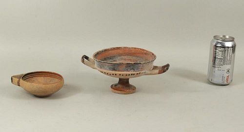 TWO EARLY ROMAN HANDLED POTTERY