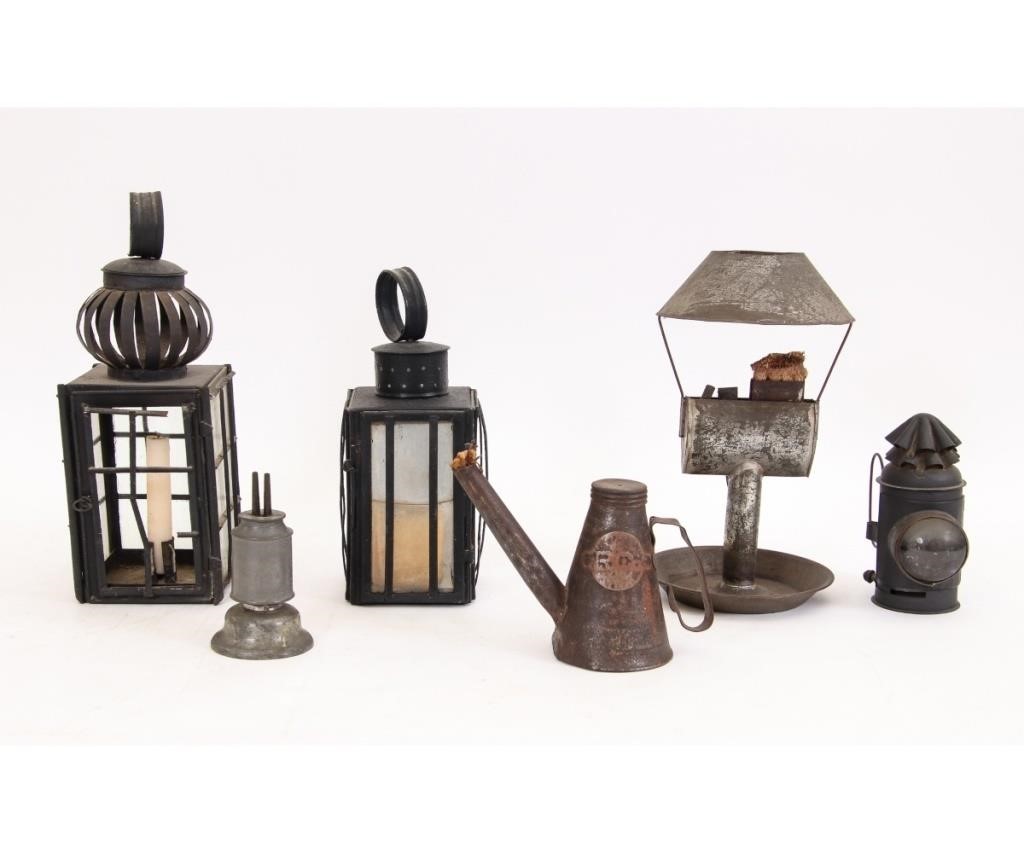 Two early tin lanterns, tallest