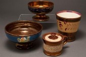 Two English copper lustre foot