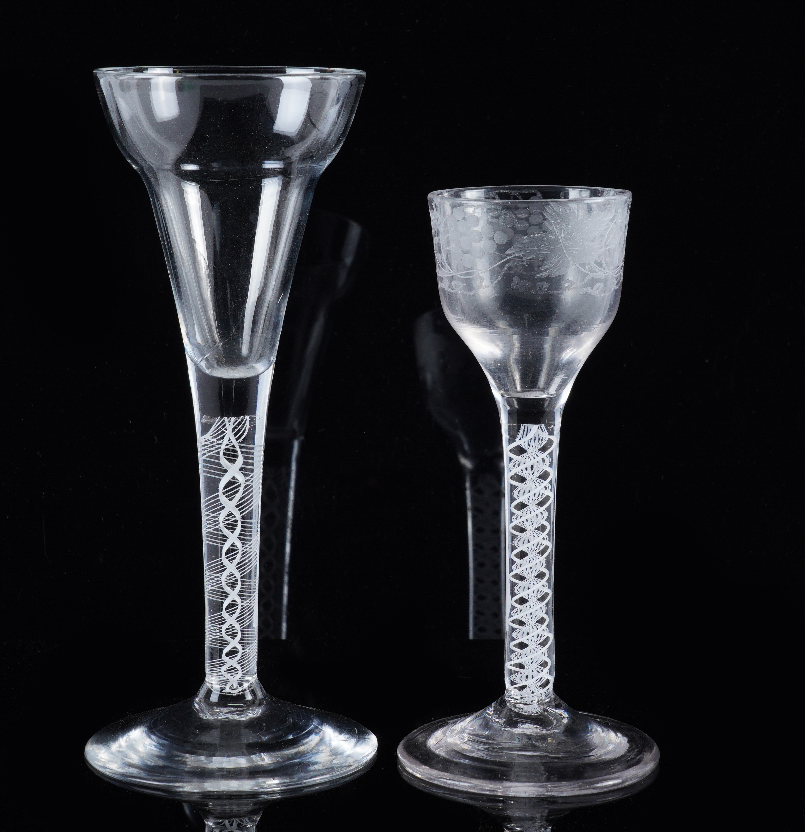 TWO ENGLISH OPAQUE TWIST STEM