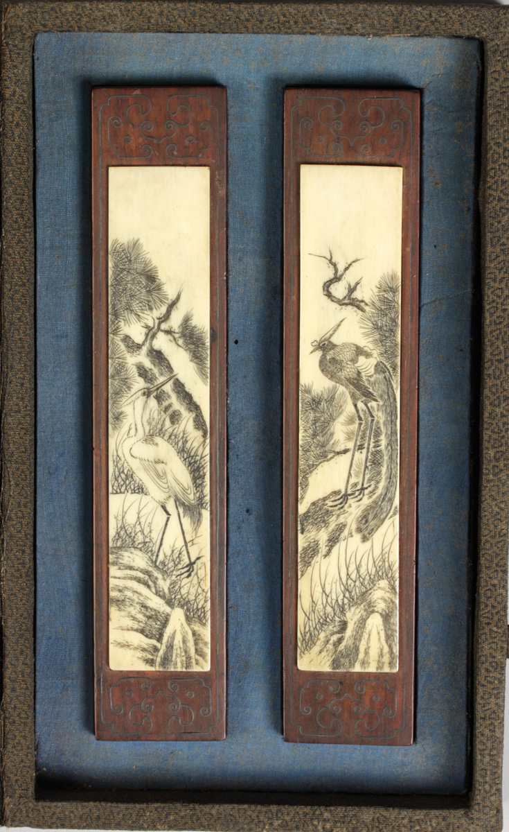 Two Engraved Ivories on Hardwood