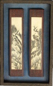 Two Engraved Ivories on Hardwo