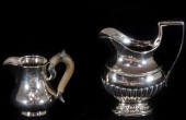 TWO EUROPEAN SILVER CREAMERS T