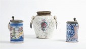 TWO FAIENCE LIDDED TANKARDSTwo