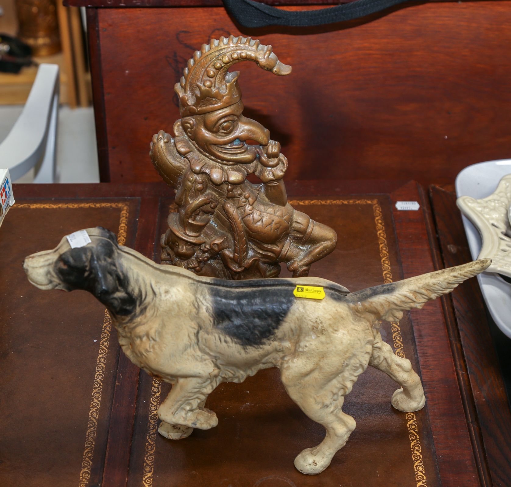 TWO FIGURAL DOORSTOPS Comprising