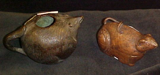 Two figural metal containers  one a
