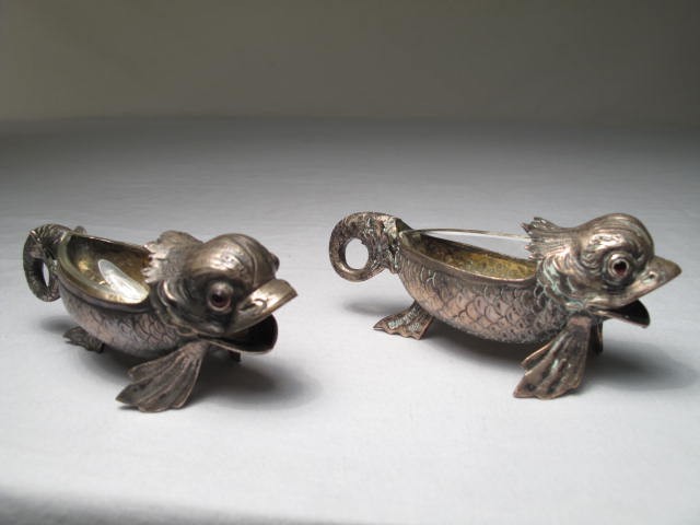 Two figural salt cellars in the