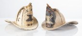 TWO FIREMAN LEATHER HELMETS 19