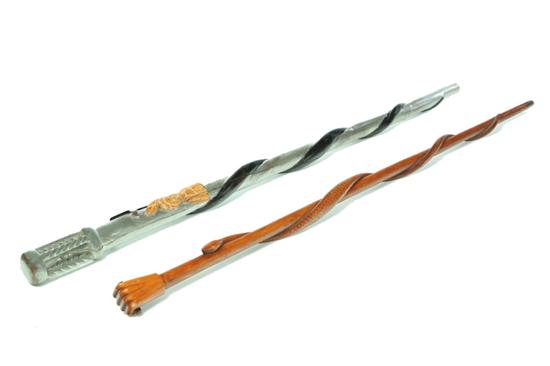TWO FOLK ART CARVED CANES. 
