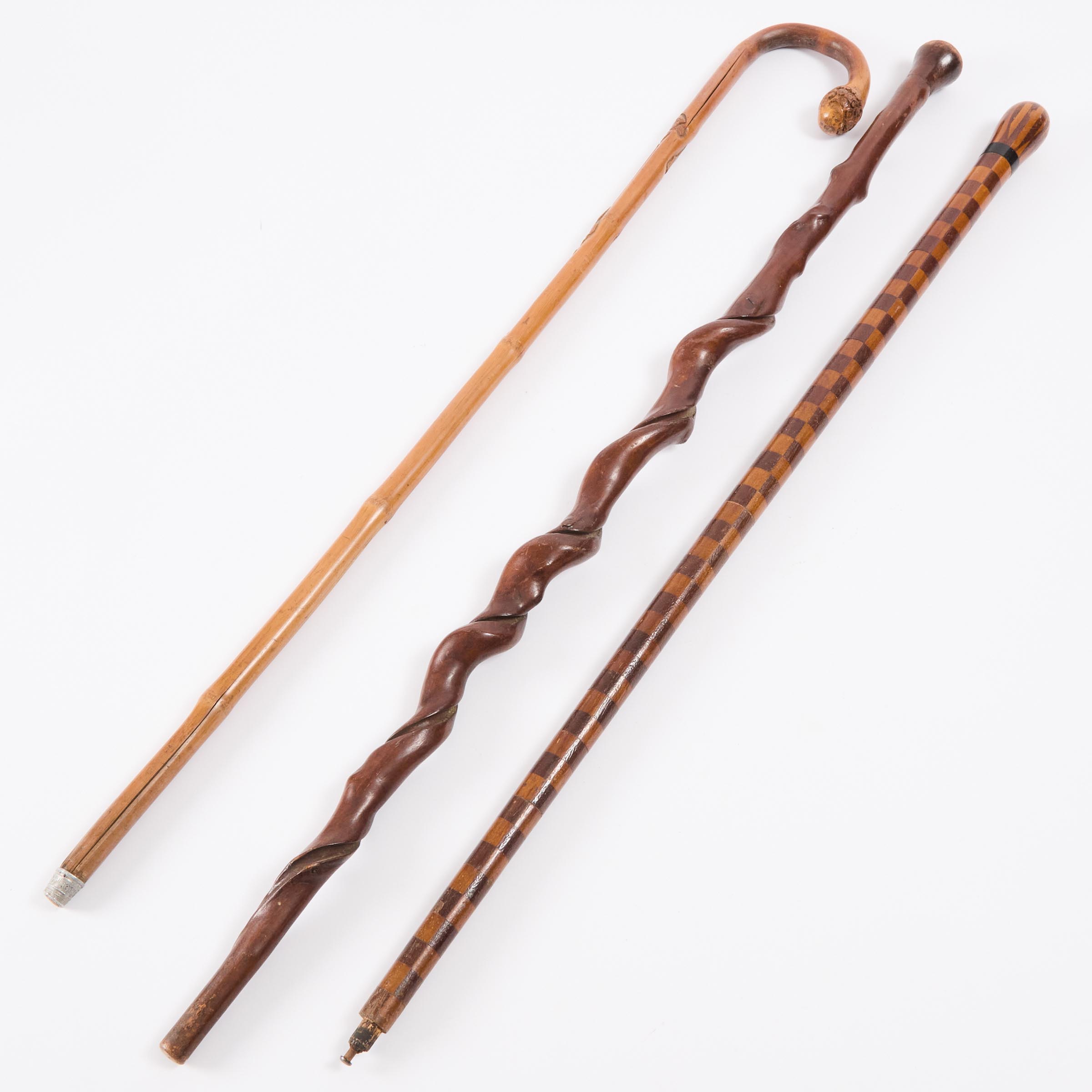Two Folk Art Walking Sticks and a