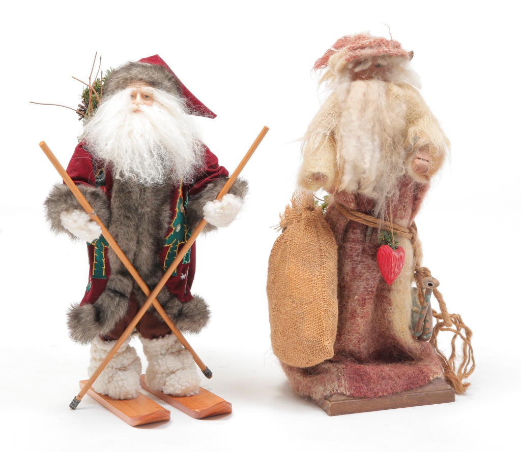 TWO FOLKSY SANTA FIGURINES.