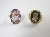 TWO FOURTEEN KARAT GOLD SOLITA