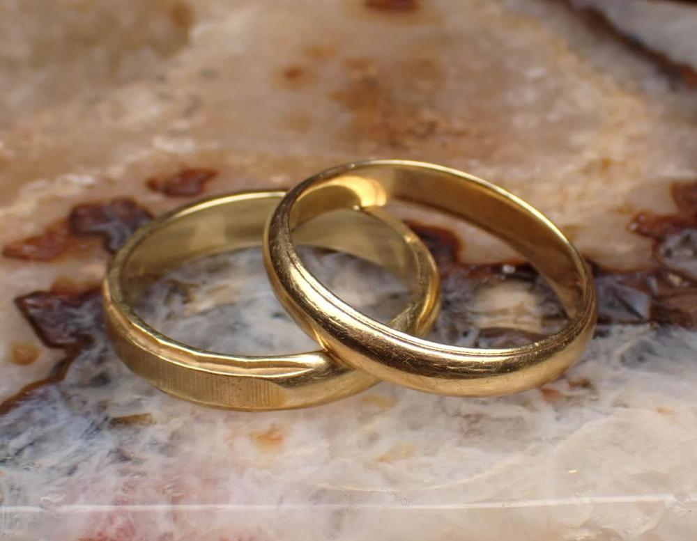 TWO FOURTEEN KARAT GOLD WEDDING