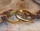 TWO FOURTEEN KARAT GOLD WEDDIN