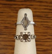 TWO FOURTEEN KARAT WHITE GOLD