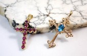 TWO FOURTEEN KARAT YELLOW GOLD