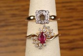 TWO FOURTEEN KARAT YELLOW GOLD
