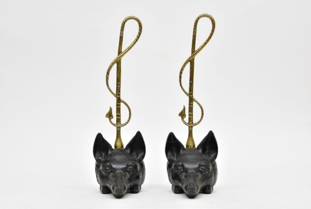 Two fox head cast iron and brass